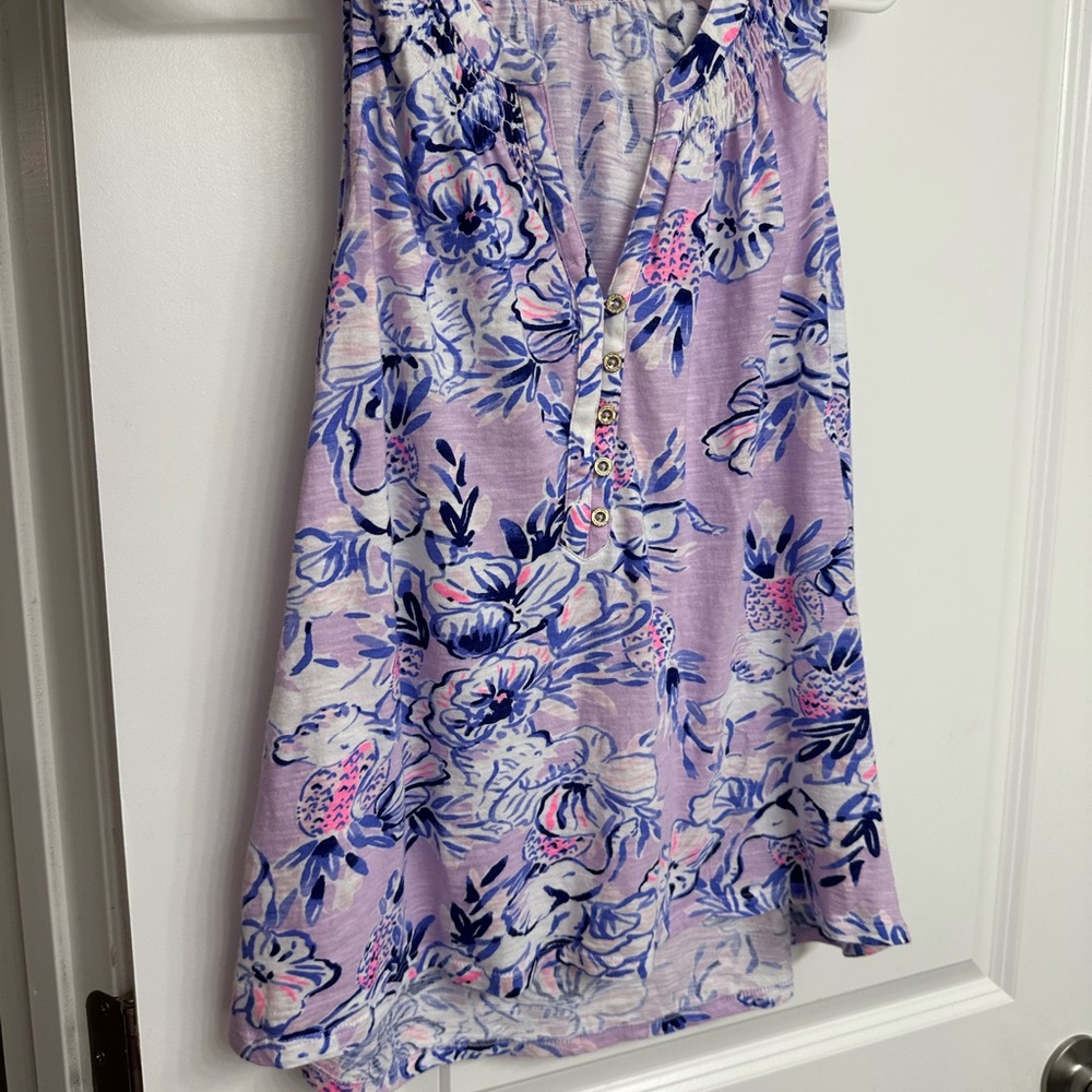 Lilly Pulitzer Purple and Blue Floral Top trunks in the air